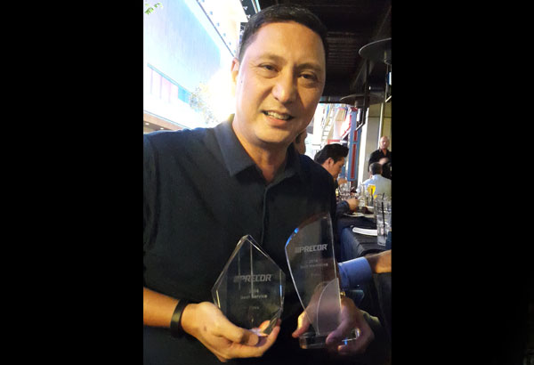 Juanchit Jose, GM of The Finix Corporation, holds the company’s two awards, Best in Marketing and Best in Service.